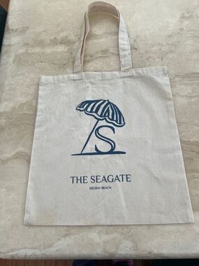 The Seagate Delray Beach Canvas Tote - Cream with Navy Print 14 1/2” x 15 1/2”